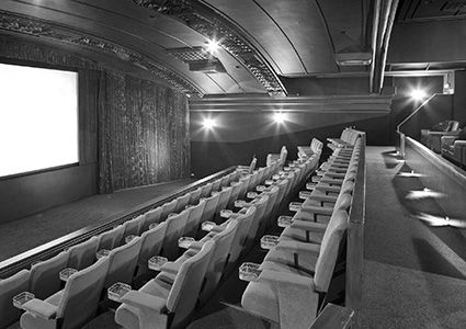  velvet seats in the regal cinema facing the large screen