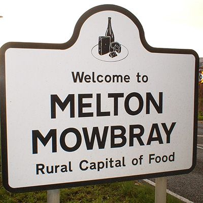  picture of a road sign which says Melton Rural Capital of Food