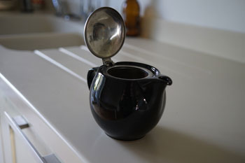 teapot on white counter top